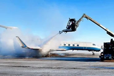 A_U.S._Army_C-37B_aircraft_transporting_Army_Chief_of_Staff_Gen._Raymond_T._Odierno,_gets_de-iced_before_it_departs_Joint_Base_Elmendorf-Richardson,_Alaska