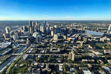Experience the Twin Cities from the Sky: Why We Recommend a Helicopter Tour and Dining at Holman's Table