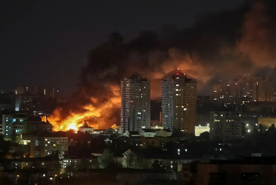 Fire and smoke rise in the city after a Russian drone strike, amid Russia's attack on Ukraine, in Kyiv, Ukraine June 6, 2025