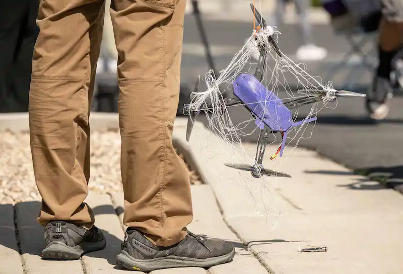 a target drone that is wrapped in netting from a Fortem Technologies drone hunter