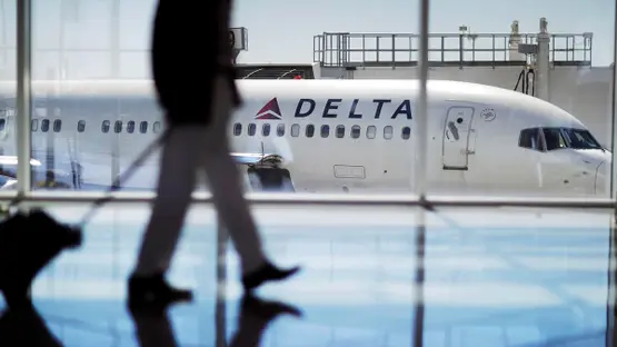 delta air lines aircraft boarding passengers in Paris Charles de Gaulle airport