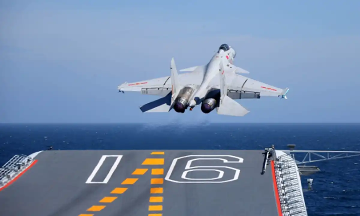 Chinese J-15 carrier-based fighter ascending during interception from the Liaoning aircraft carrier