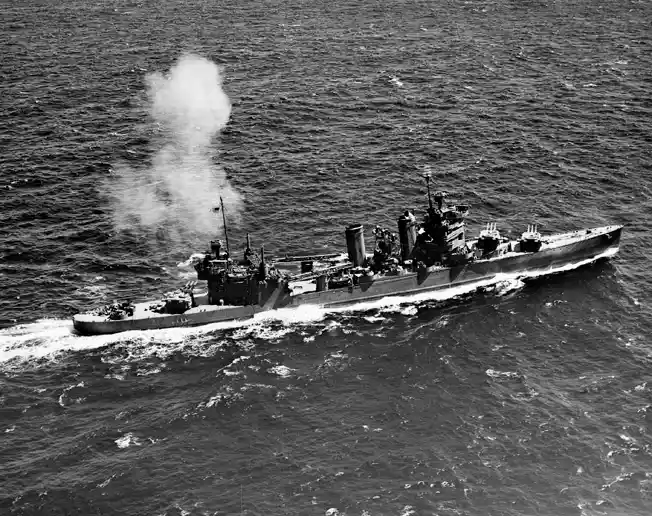 The USS Astoria fires its 8-inch guns during gunnery practice off Hawaii in July 1942