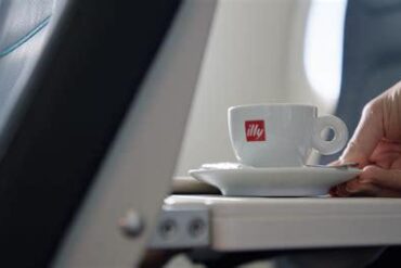 The Curious Joy of Drinking Espresso in Air Dolomiti Economy Class