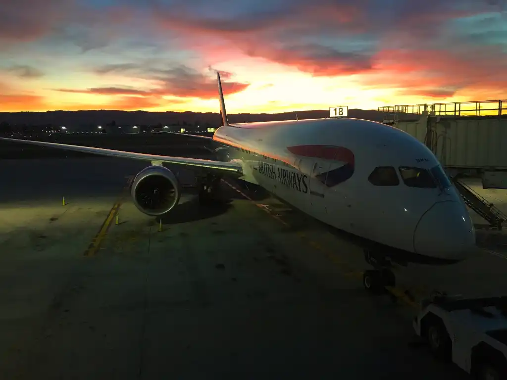 Boeing 787-8 Dreamliner on long-haul route departure at sunset