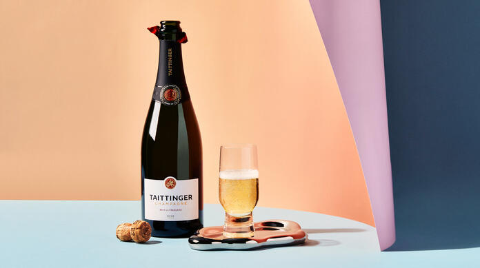 Delta One business class dining presentation with champagne
