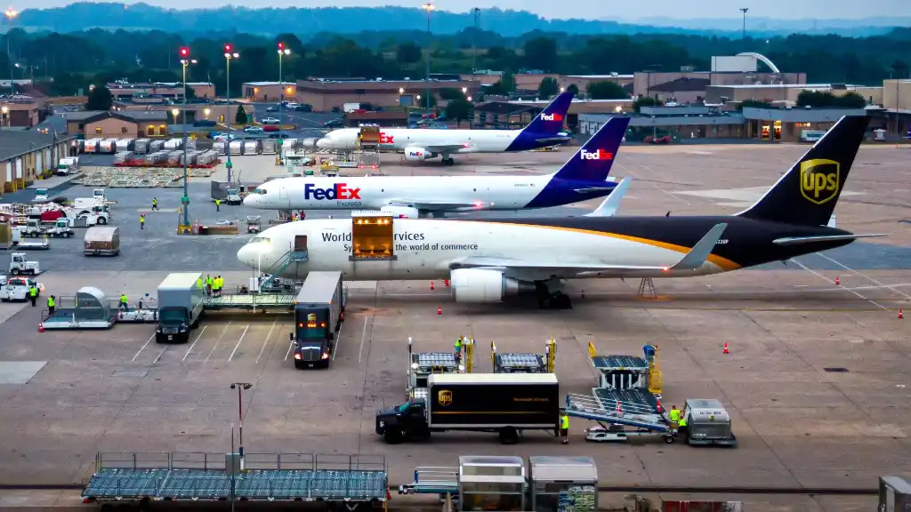 FedEx Express and UPS cargo jets deliver packages to Harrisburg International Airport in Pennsylvania