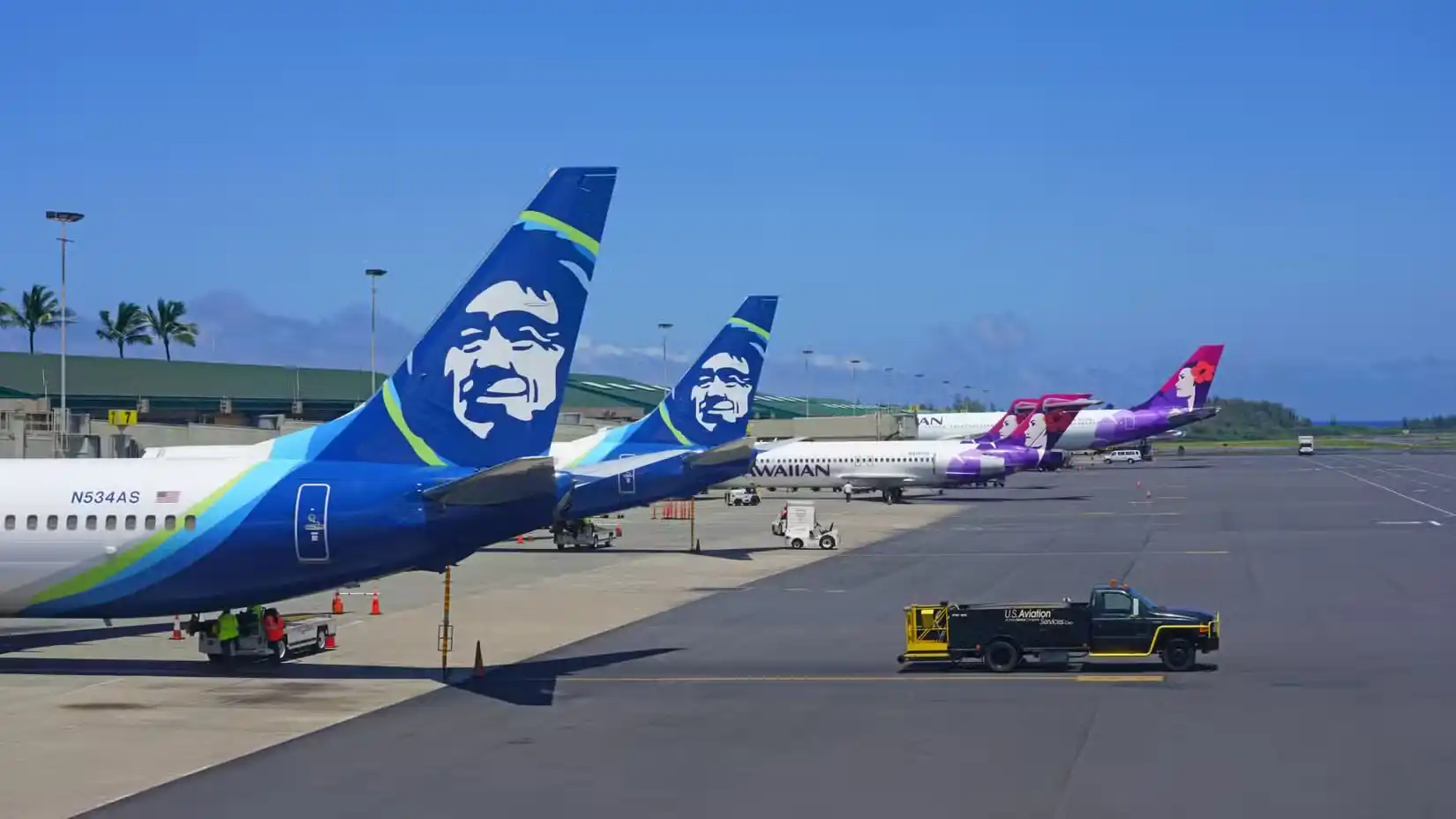 alaska and hawaiian airlines aircraft together post-merger branding strategy