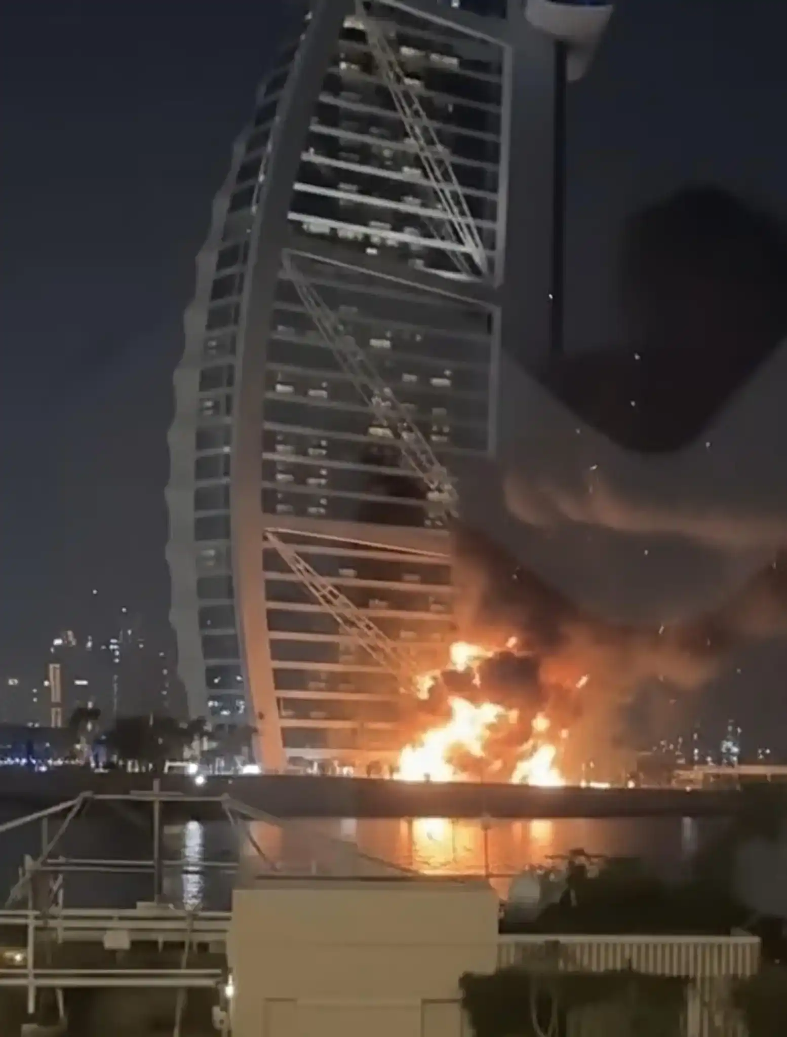 Burj Al Arab exterior with visible smoke damage after drone incident