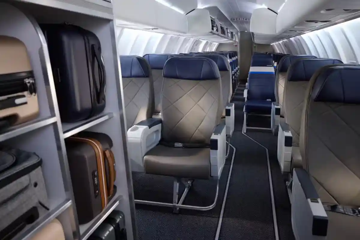 United Express CRJ450 interior economy class luggage closet regional jet cabin