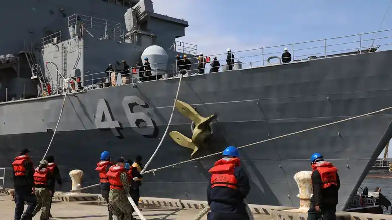 USS Tortuga LSD-46 undergoing modernization work in dry dock at naval shipyard
