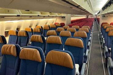 Why Airlines Really Oversell Business Class Seats — And What Happens When Everyone Shows Up