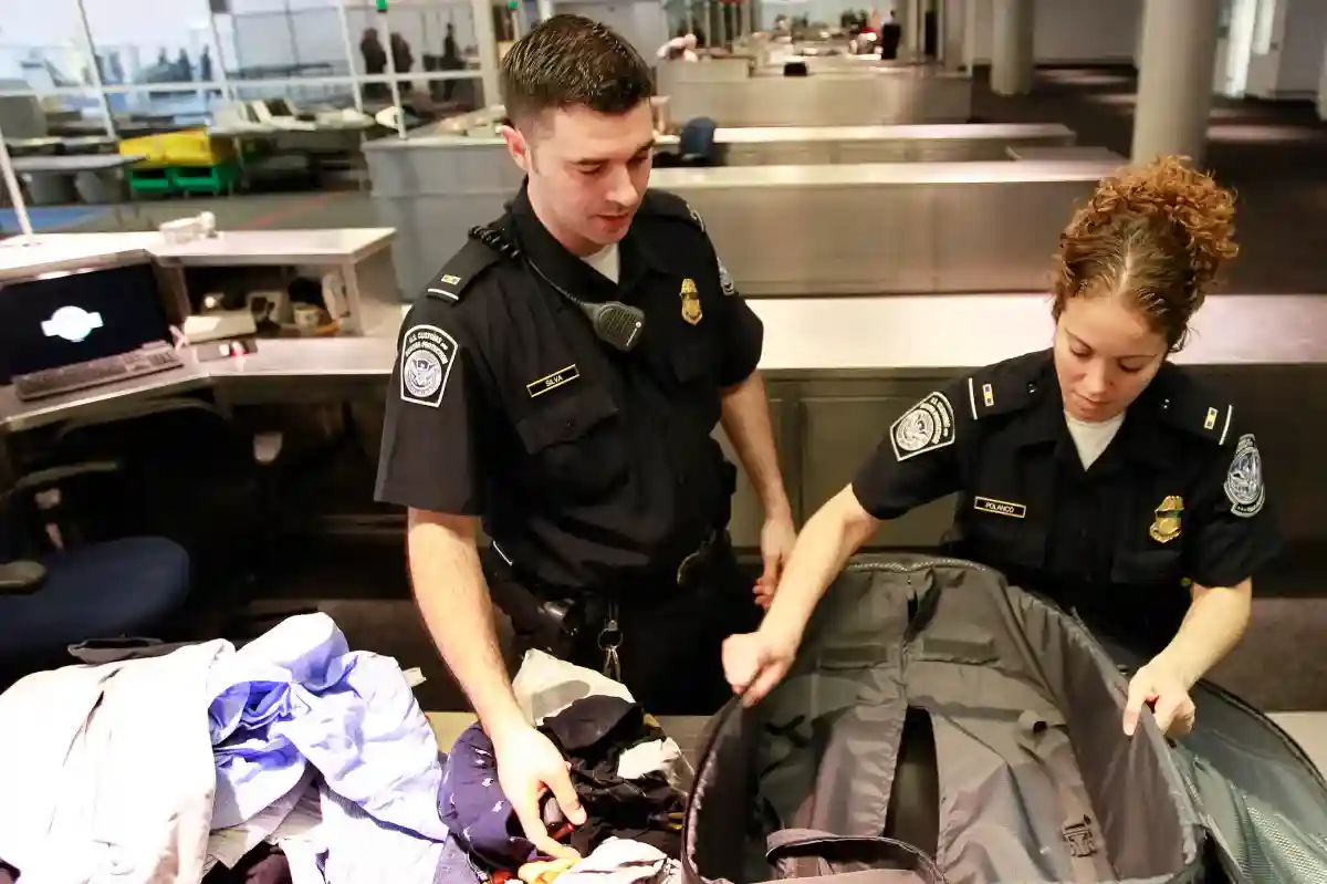 customs and border protection officers at JFK international arrivals terminal