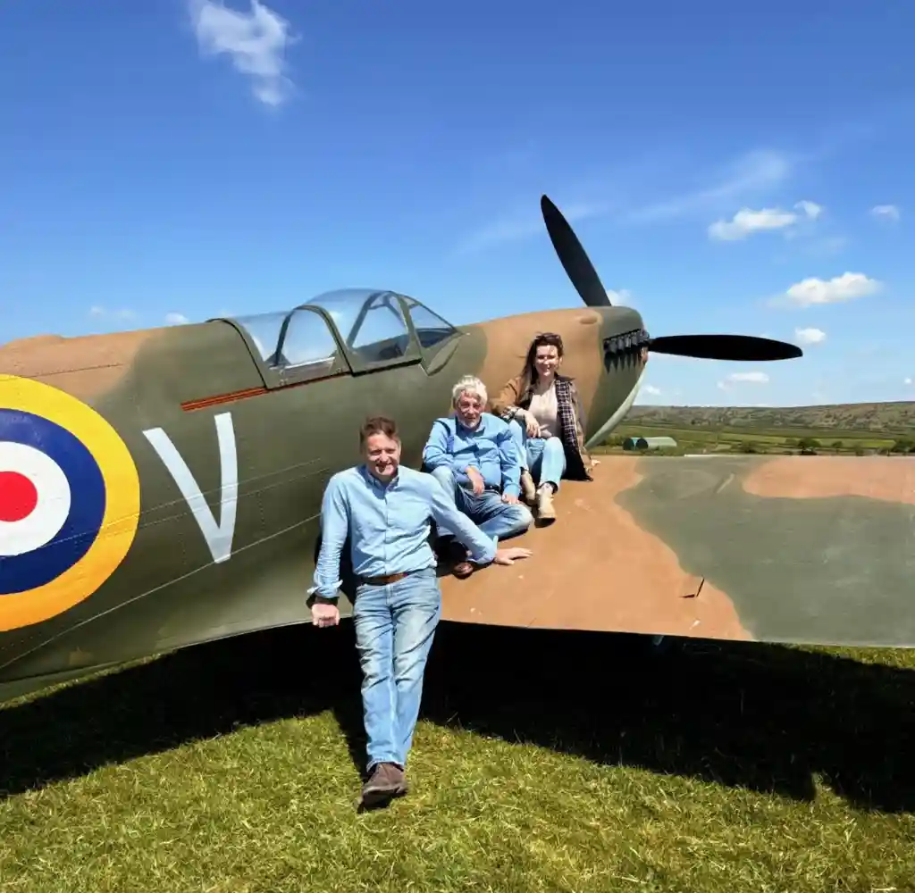 visitors examining Aerolite Spitfire Type 433 at British airshow exhibition