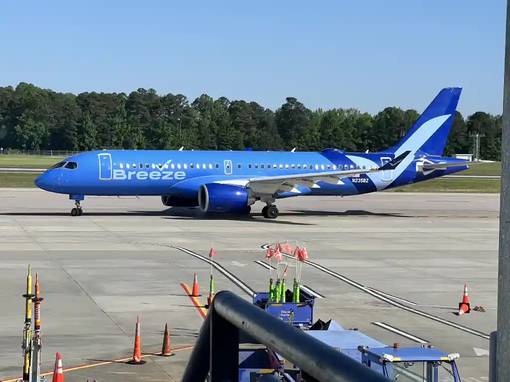 Breeze Airways Airbus A220 departing Raleigh Durham International Airport