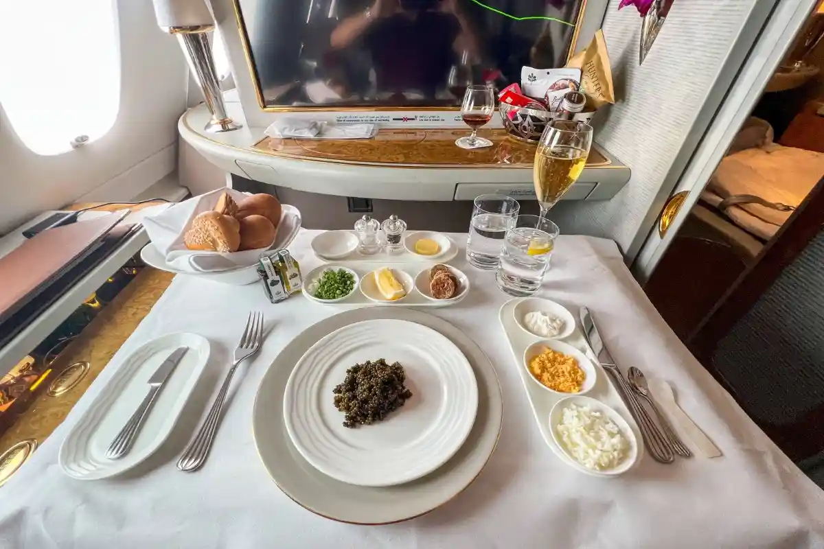 Emirates first class private suite gourmet dining setup