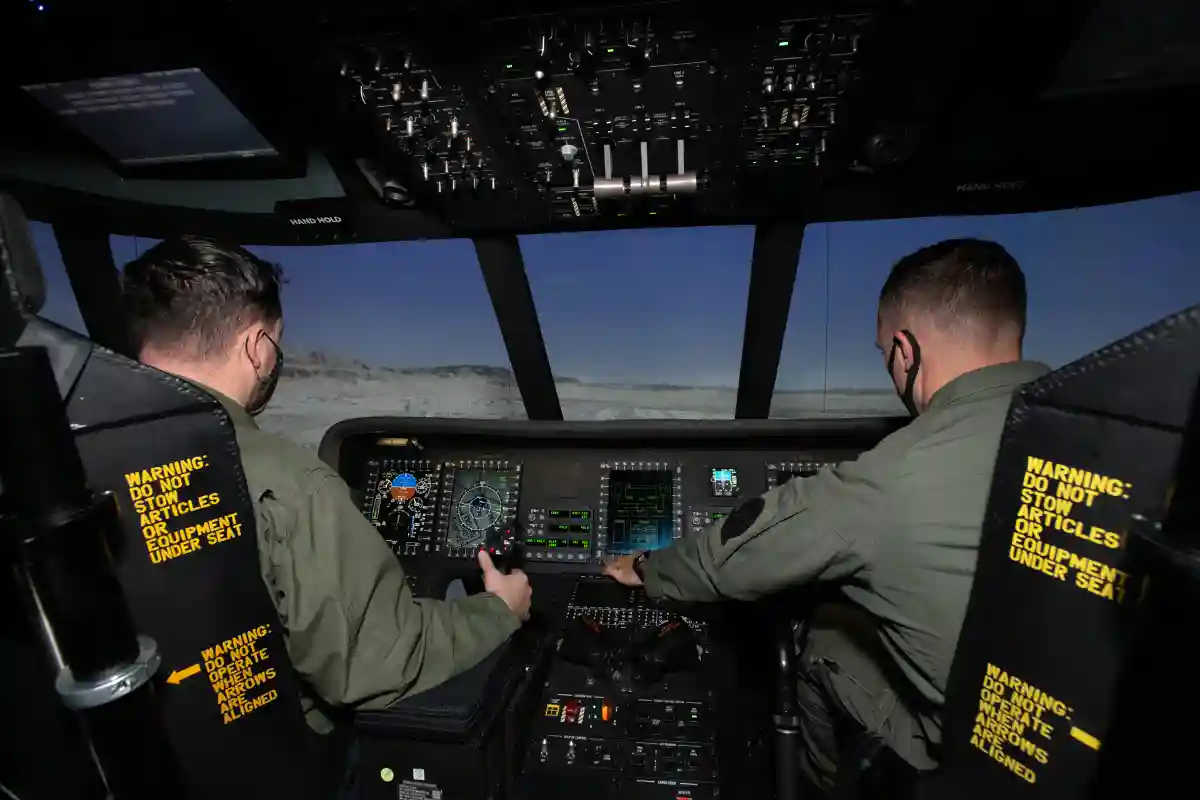 Marine Corps instructor pilot conducting advanced flight simulator training