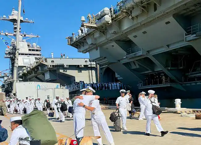 Naval Station Norfolk with USS Gerald R Ford docked during power transfer preparations