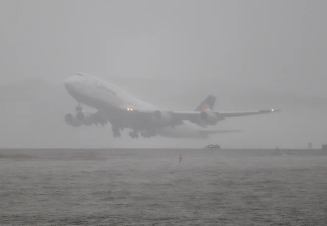 commercial airliners approaching San Francisco Airport through Bay Area fog