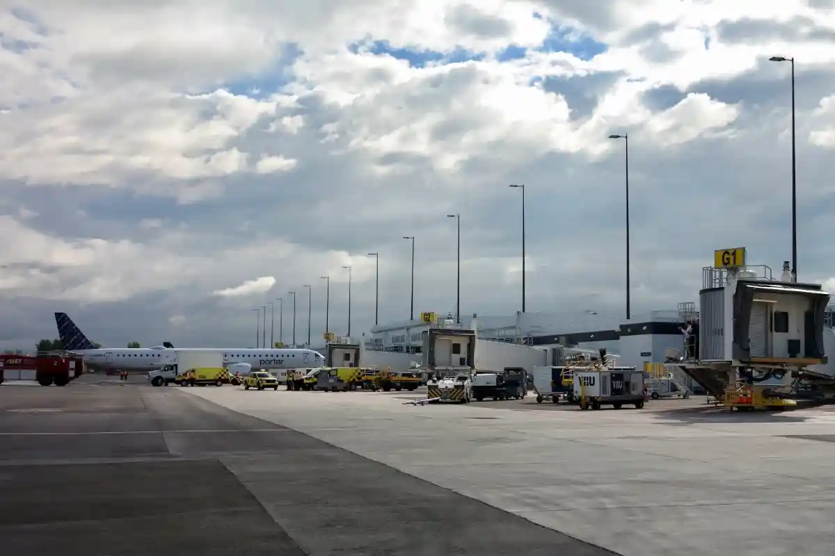 domestic passengers boarding Porter Airlines flight at YHU terminal