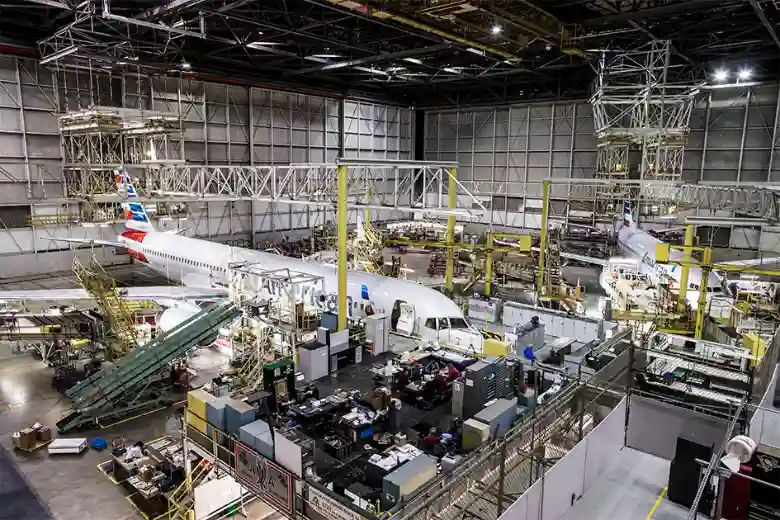 American Airlines aircraft undergoing heavy maintenance inside Tech Ops Tulsa hangar