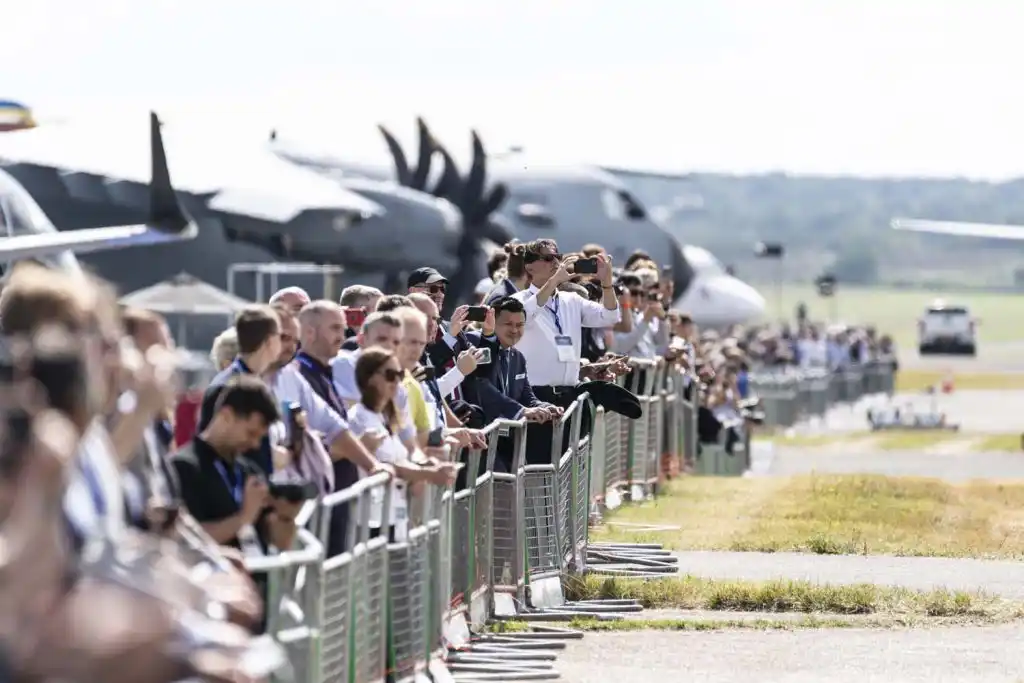 Farnborough airshow aircraft display with crowded aviation event traffic