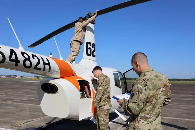 military helicopter flight school student practicing training maneuvers