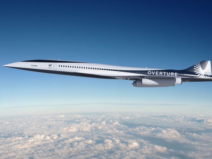 Boom Supersonic Overture aircraft prototype design flying above clouds