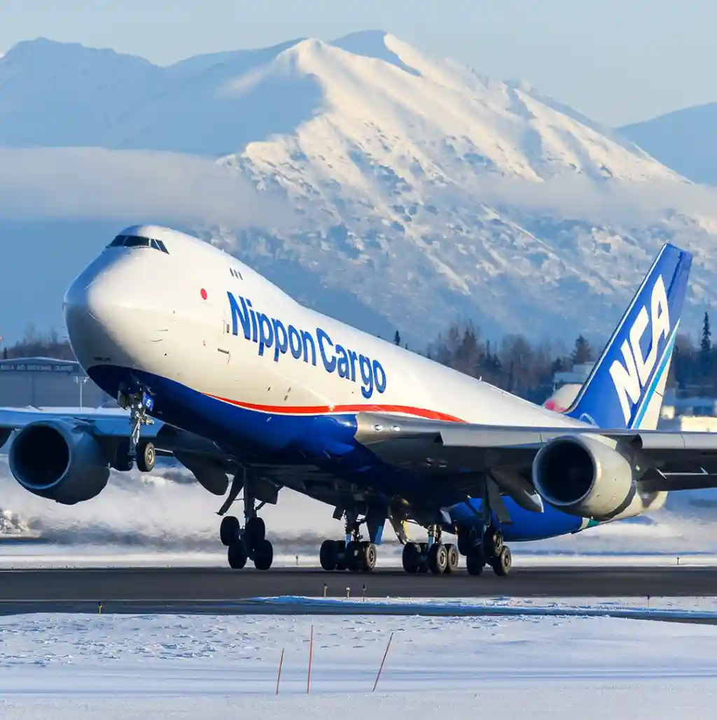 Nippon Cargo Boeing 747-8F leaving Anchorage in a beautiful winter afternoon