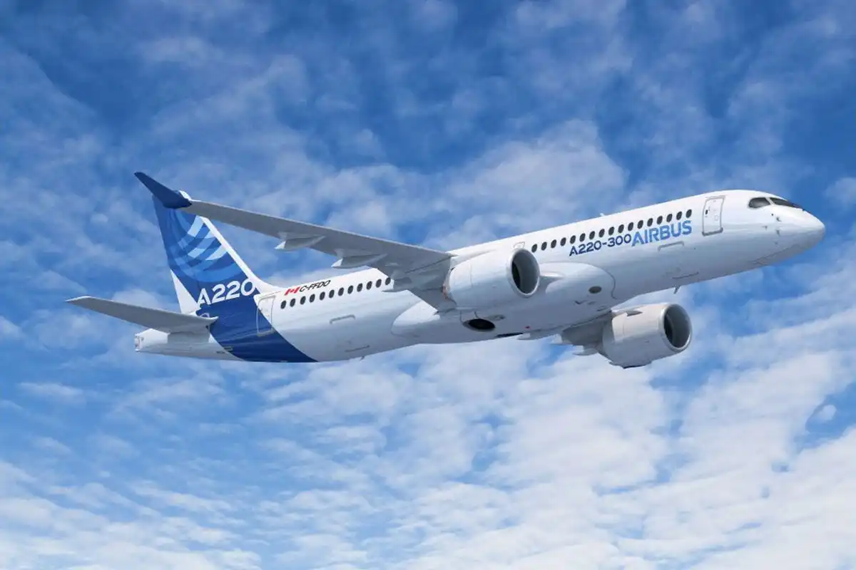 Airbus A220 aircraft flying modern single aisle passenger jet