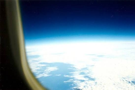Concorde passenger window view dark sky Earth curvature 60000 feet altitude