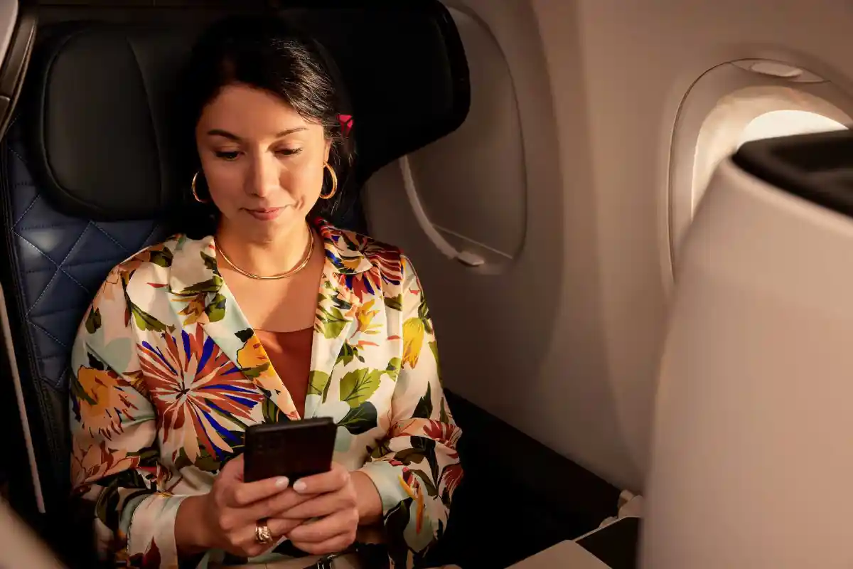 Delta Air Lines passengers using fast onboard Wi-Fi during a long-haul flight