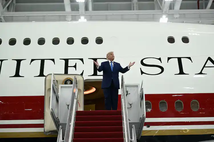 President Donald Trump steps out of the new Air Force One