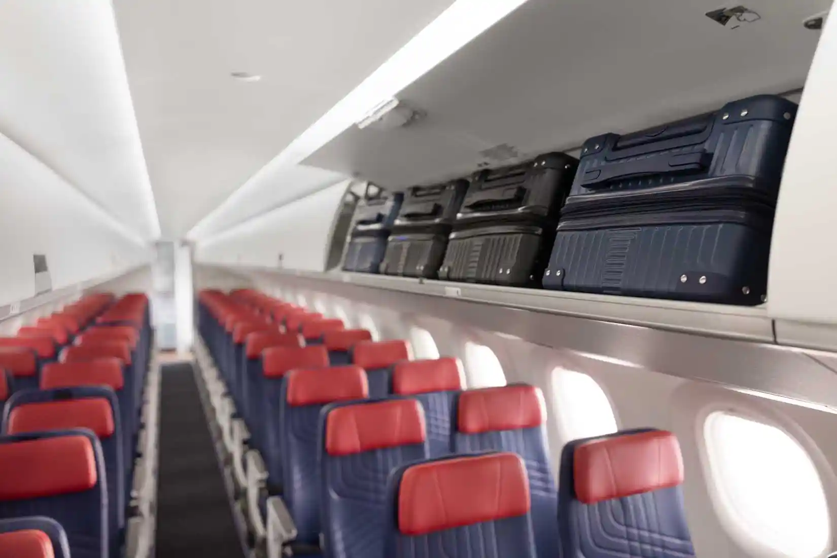 LATAM Airlines Brazil Embraer E195-E2 cabin with two-by-two seating and premium economy seats