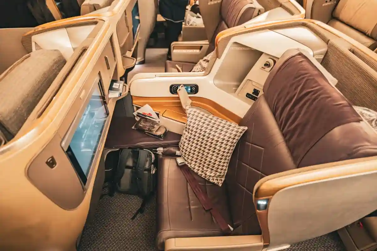 Singapore Airlines 777-300ER business class fully flat seat and 18-inch entertainment screen